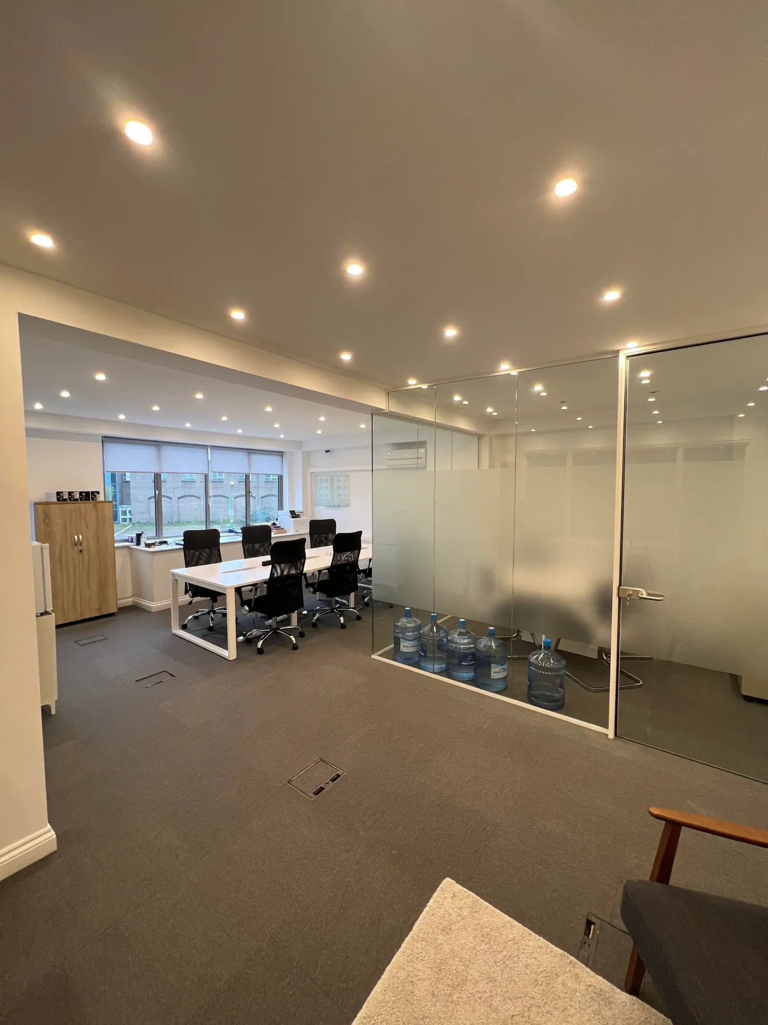 Office Workspace with Glass Partitions